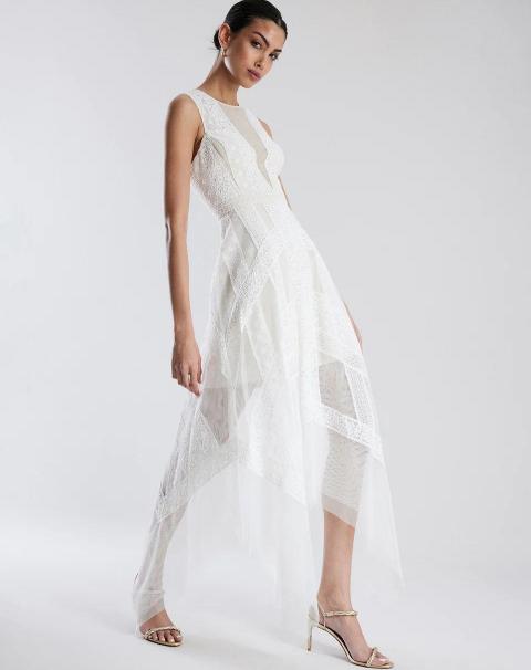 Біла коктейльна сукня з вишивкою 1765